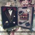 A stylish gift bag for him, featuring a sleek design and elegant accents. The bag is displayed with sturdy handles, showcasing its spacious interior ideal for various gifts, perfect for special occasions.