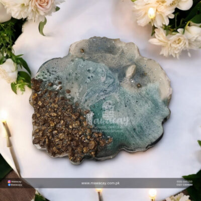 Handmade resin tray featuring vibrant colors and unique patterns, showcasing a smooth surface and raised edges, ideal for serving or displaying items