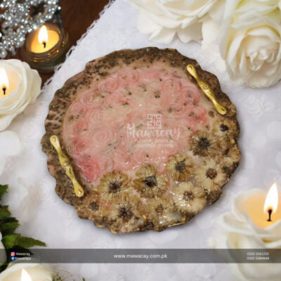 Handmade resin tray featuring vibrant colors and unique patterns, showcasing a smooth surface and raised edges, ideal for serving or displaying items